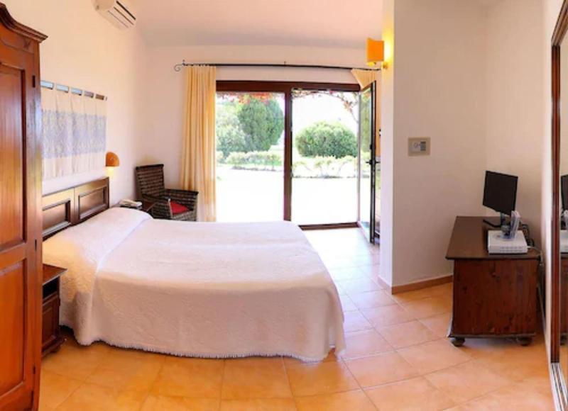 Hotel Spartivento Chia Esterno foto