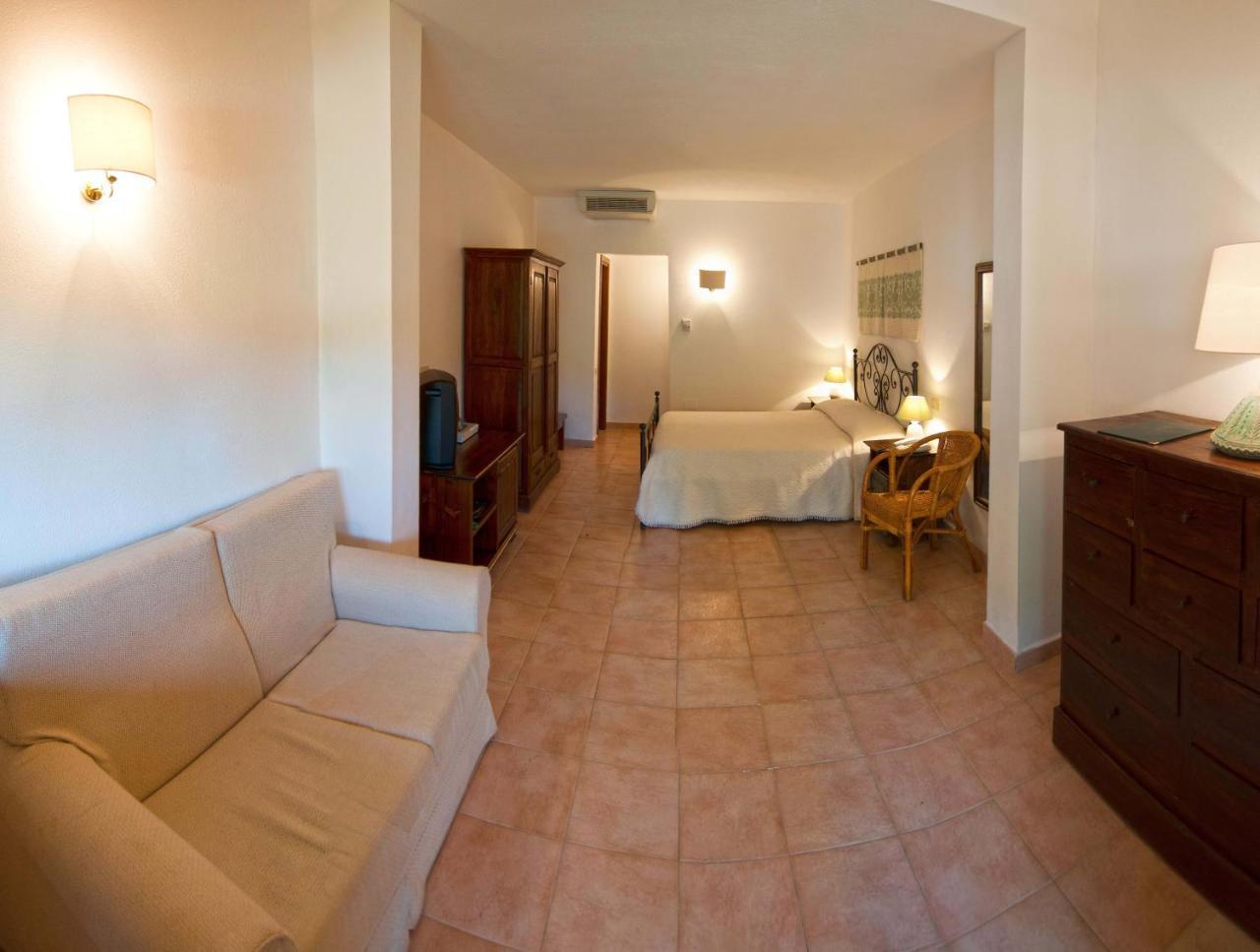 Hotel Spartivento Chia Esterno foto